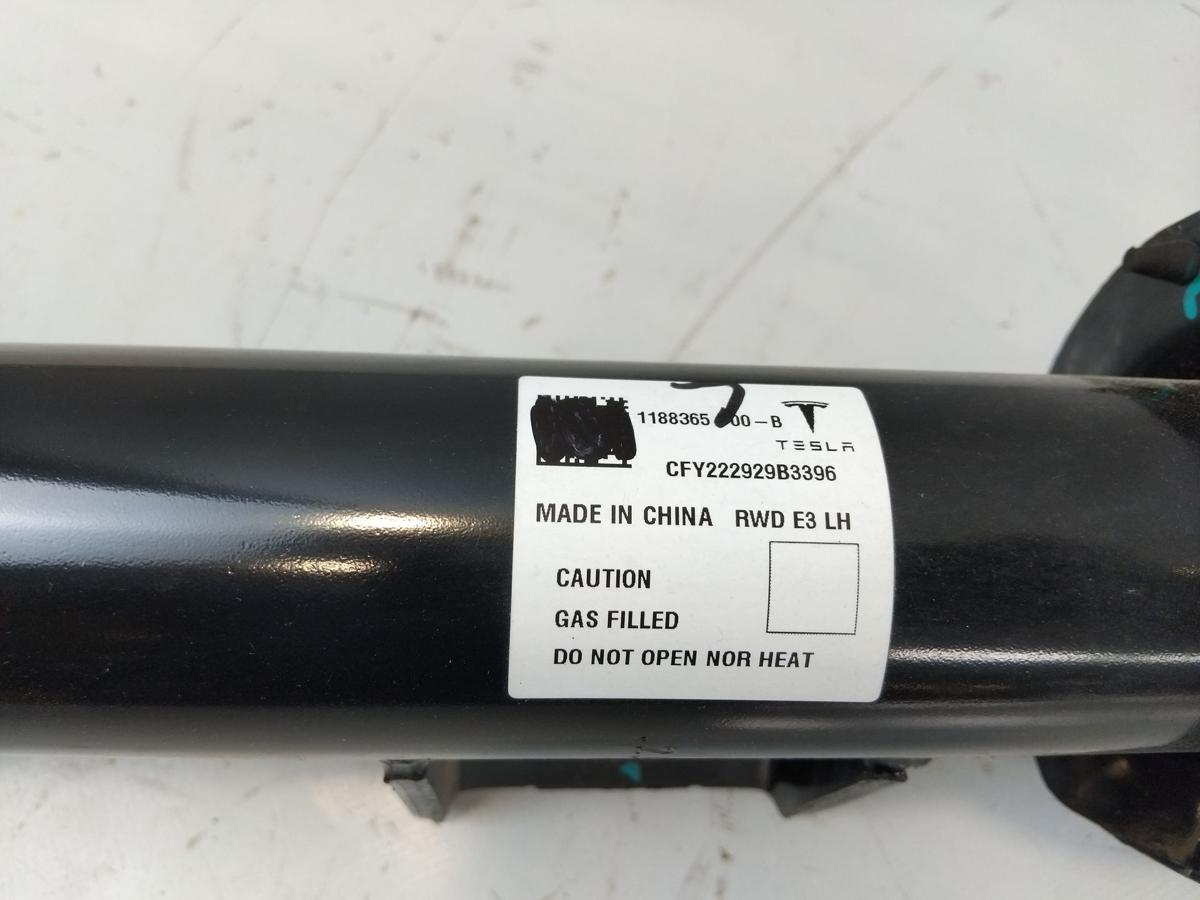 Tesla Model Y RWD original Federbein Vorderachse links 1188365-00-B Bj.2023