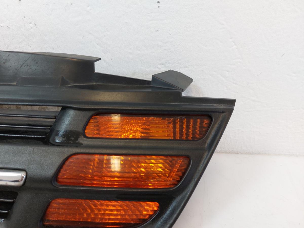 Nissan Micra K12 Kühlergrill Frontgrill Grill vorn links mit Blinkleuchte bis 05
