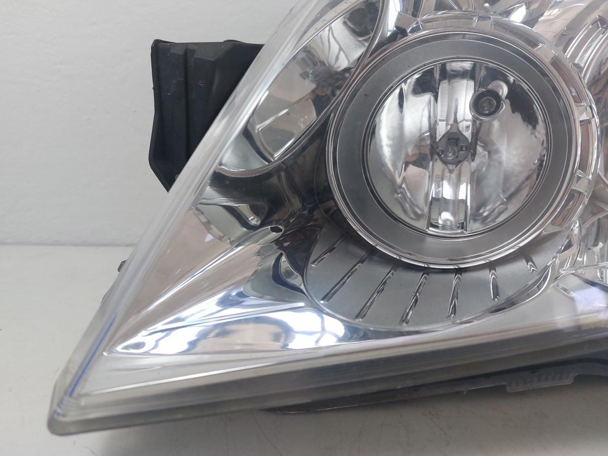 Opel Astra H Scheinwerfer links Hauptscheinwerfer Halogen OEM Hella Chrom 04-10