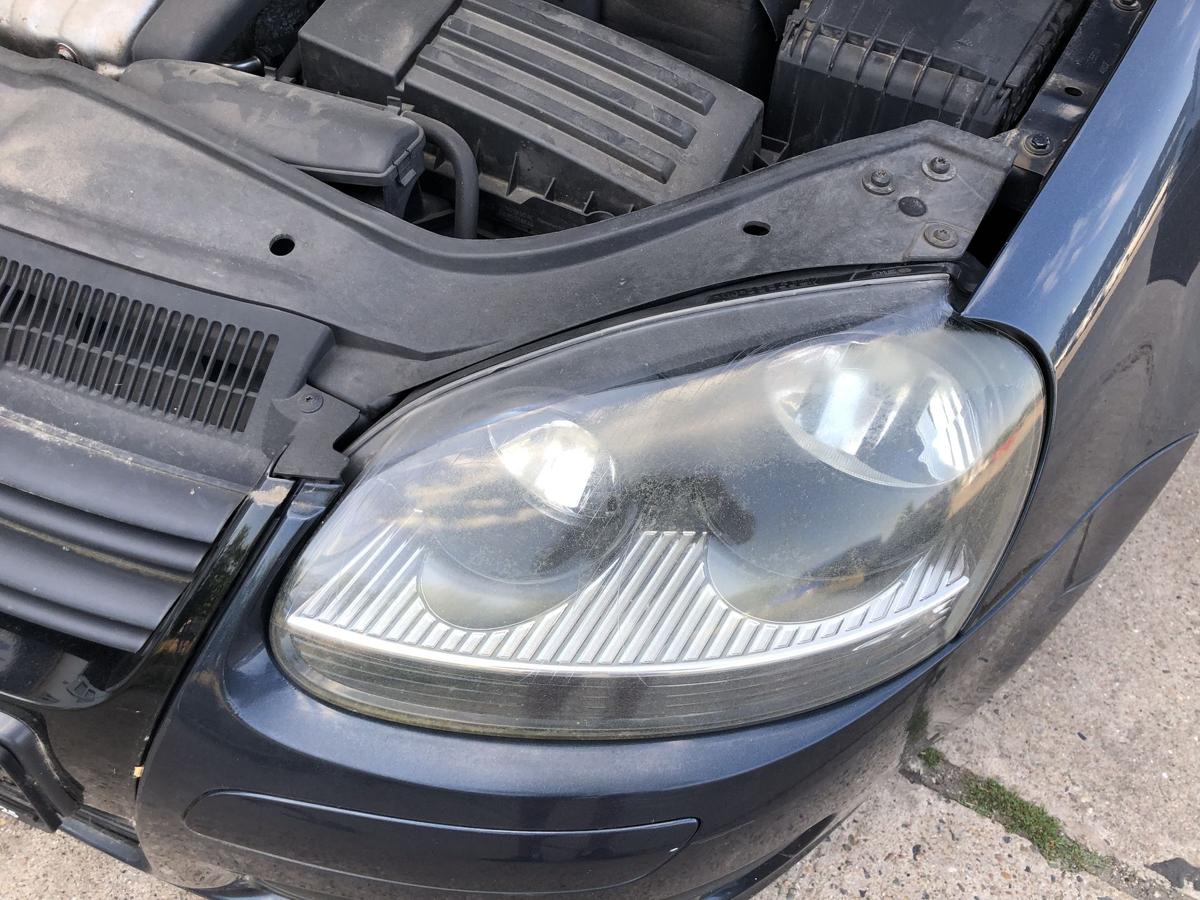 VW Golf 5 V 1K Scheinwerfer links Hauptscheinwerfer schwarze Version Hella Tr&uuml;b