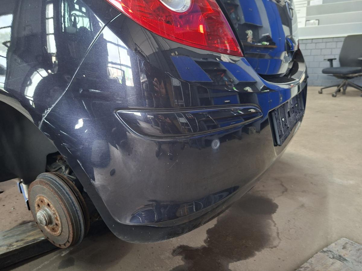 Opel Corsa D orig Stoßfänger Stoßstange hinten 2HU Saphirschwarz Metallic Bj 2007