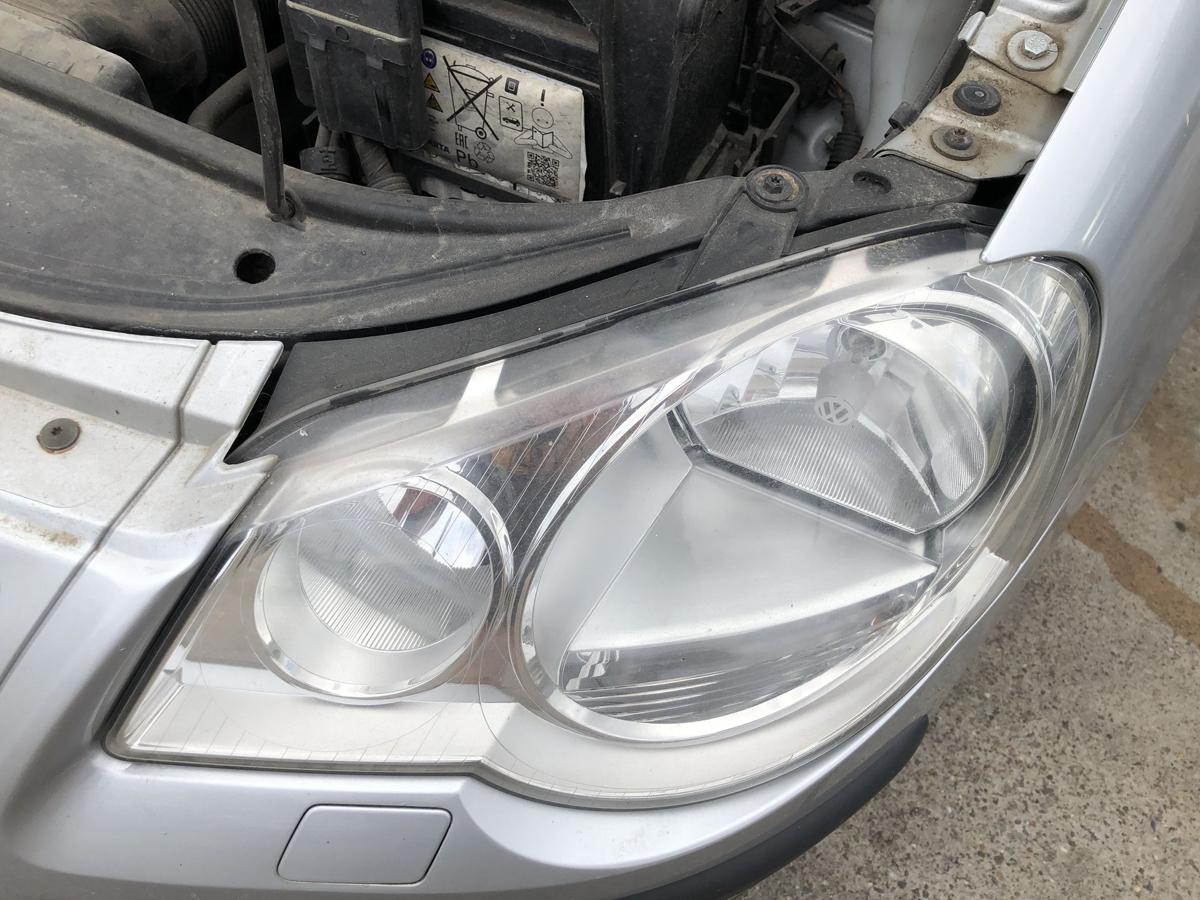 VW Polo 9N3 Scheinwerfer links Hauptscheinwerfer Halogen Hella OEM