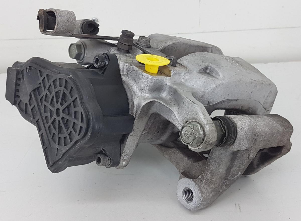 Tesla Model Y Bremssattel hinten links Bj2022 1044628-00-A inkl Tr&auml;ger