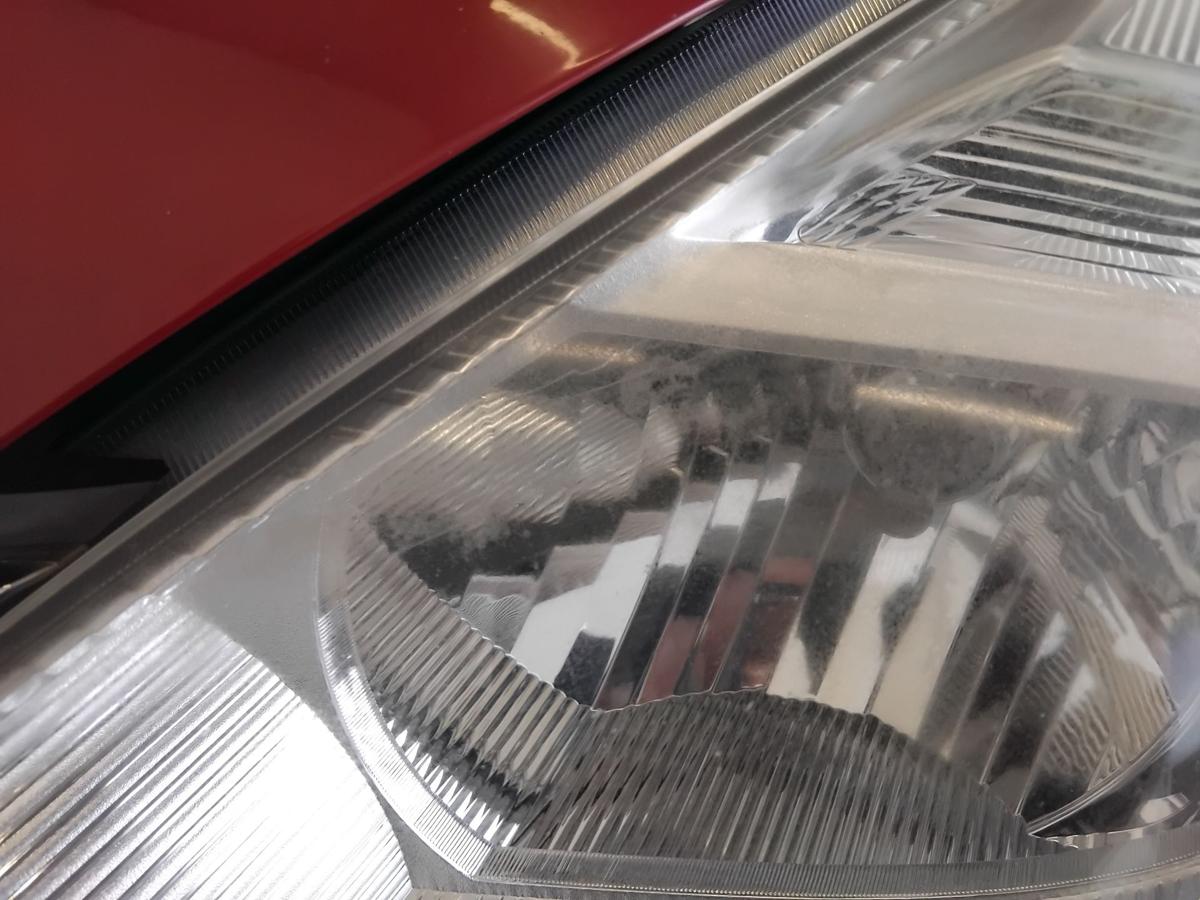 Nissan Tiida C11 original Scheinwerfer links Halogen mit LWR BJ2009 tr&uuml;b