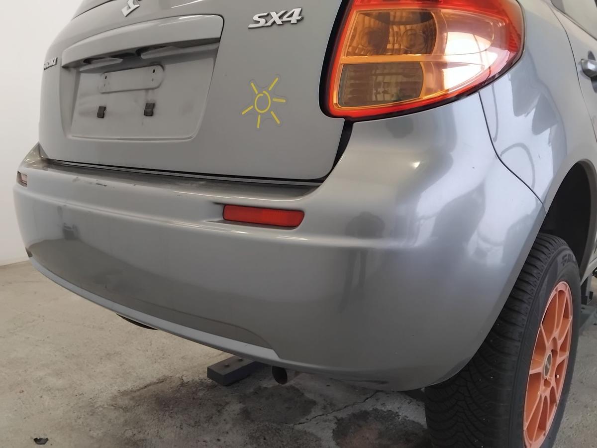 Suzuki SX4 original Sto&szlig;f&auml;nger Sto&szlig;stange hinten 5t&uuml;rig BJ2006 ZCD Galactic Gray