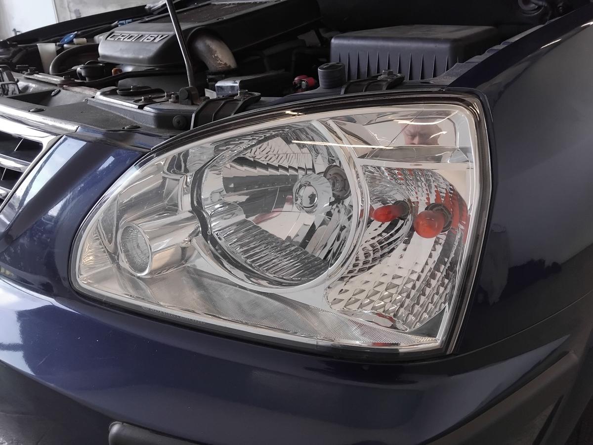 Kia Carens II original Scheinwerfer links Halogen mit LWR BJ2002