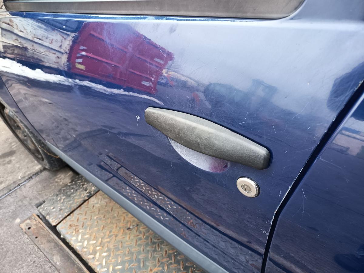 Dacia Sandero 1 original T&uuml;r vorn links Fahrer 61H Blue marine Bj 2009