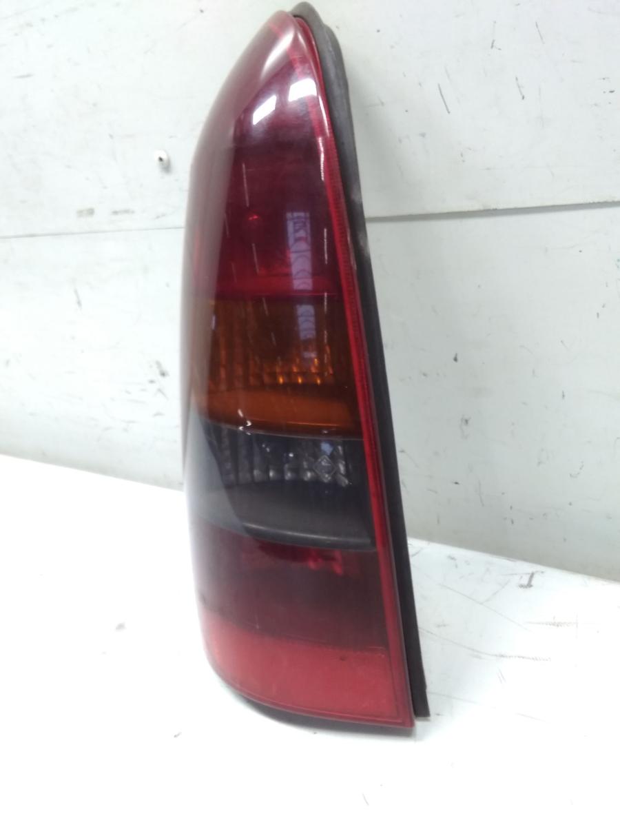 Opel Astra G Caravan original Rückleuchte Heckleuchte links abgedunkelt Bj.2003