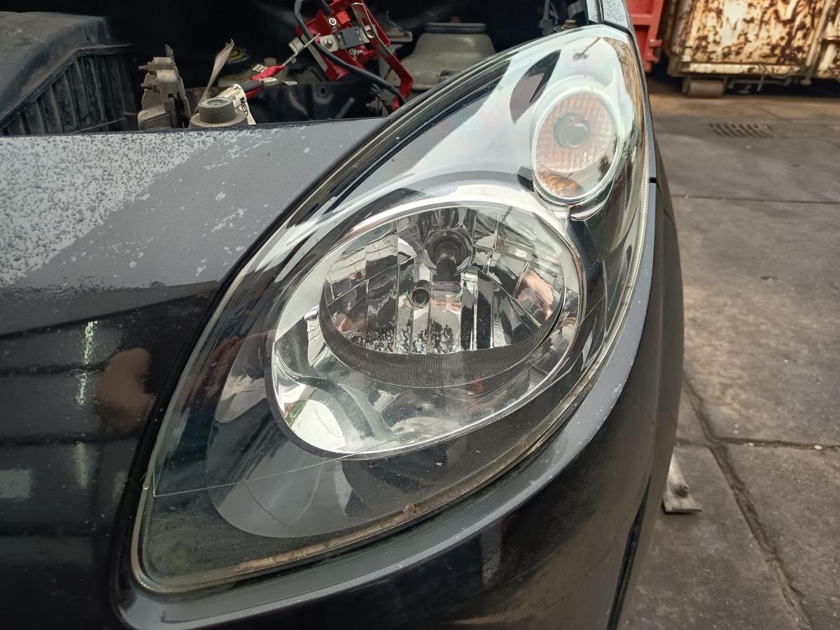 Renault Twingo II original Hauptscheinwerfer links Halogen Frontlicht Bj 2011