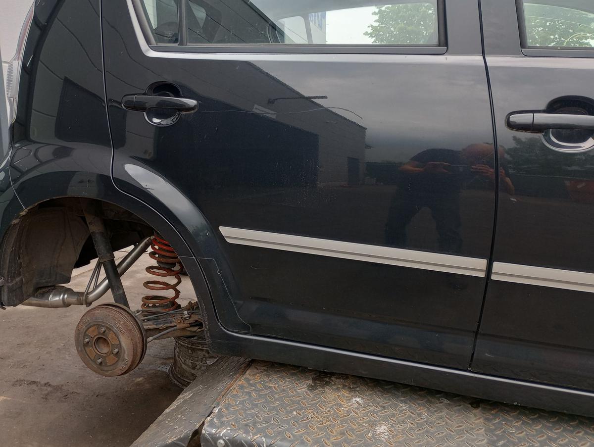 Daihatsu Sirion M3 orig Tür hinten rechts Beifahrerseite X07 schwarz Bj 2005