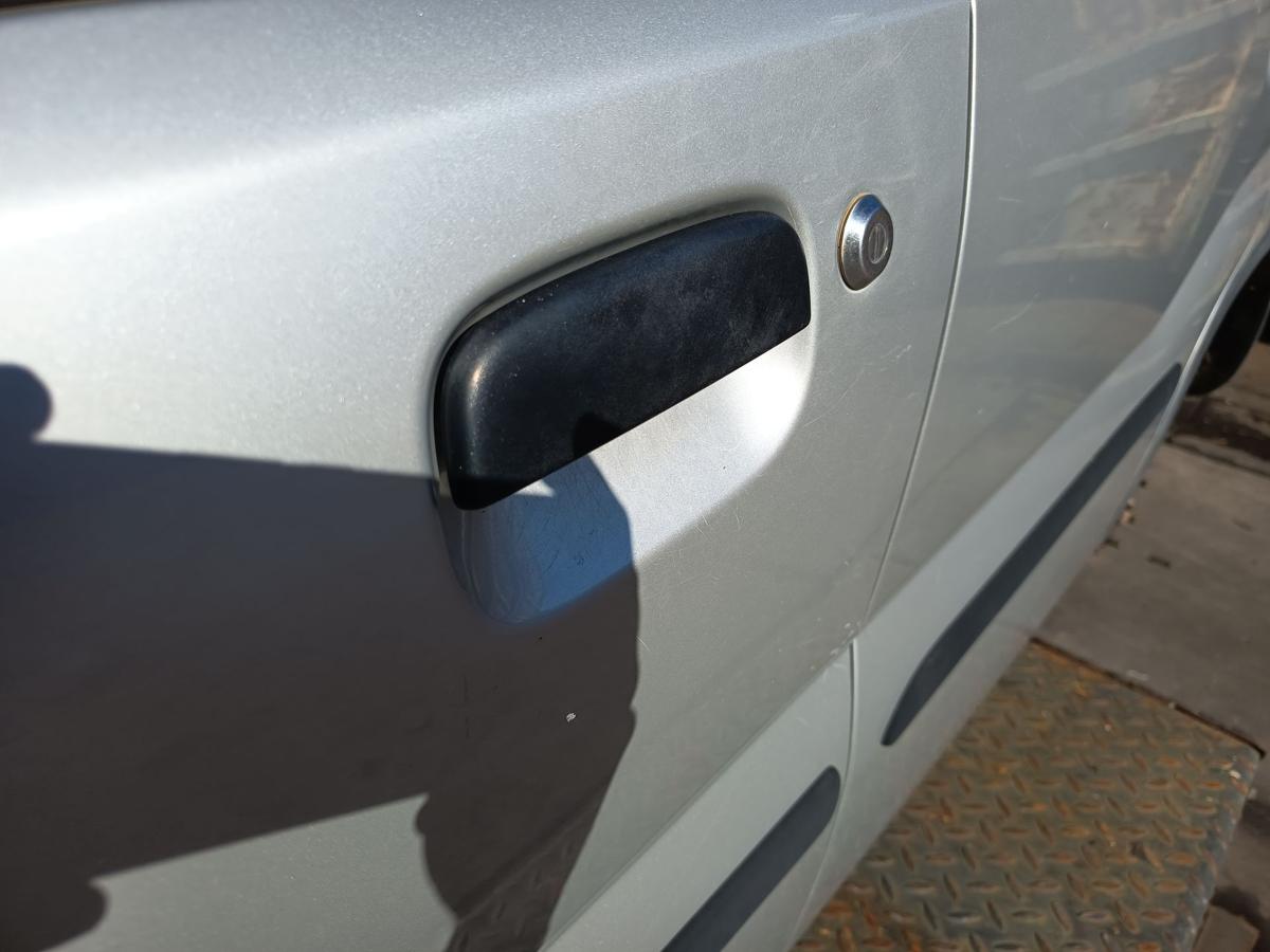 Suzuki Ignis I original T&uuml;r vorn links Fahrer Z2S Silber Bj 2001