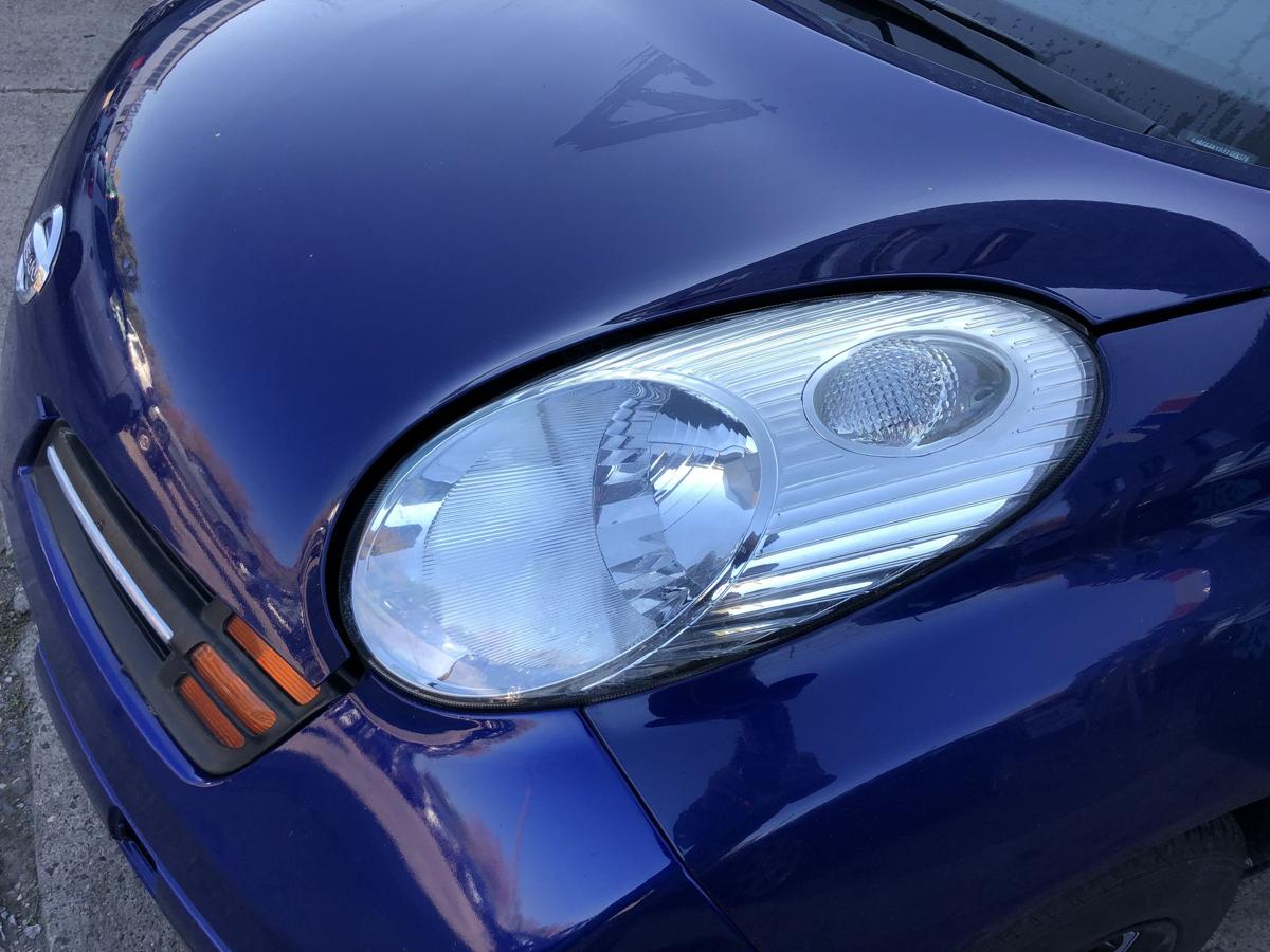 Nissan Micra K12 Scheinwerfer links Frontscheinwerfer Zubehörteil TYC Text lesen