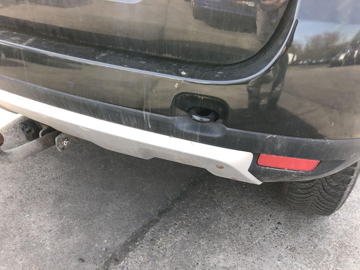 Dacia Duster 1 Typ HS Sto&szlig;f&auml;nger hinten Hecksch&uuml;rze NV676 Noir Nacre schwarz