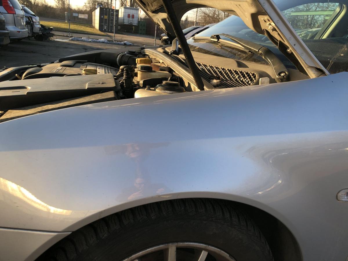 Saab 9-3 Typ YS3F Kotfl&uuml;gel links Fender Radabdeckung silber