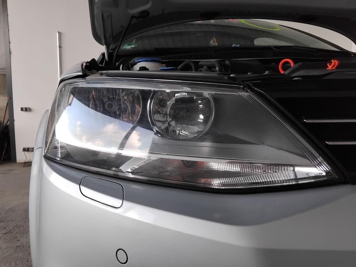 VW Jetta VI 162 original Scheinwerfer rechts Hella Halogen mit LWR BJ2012
