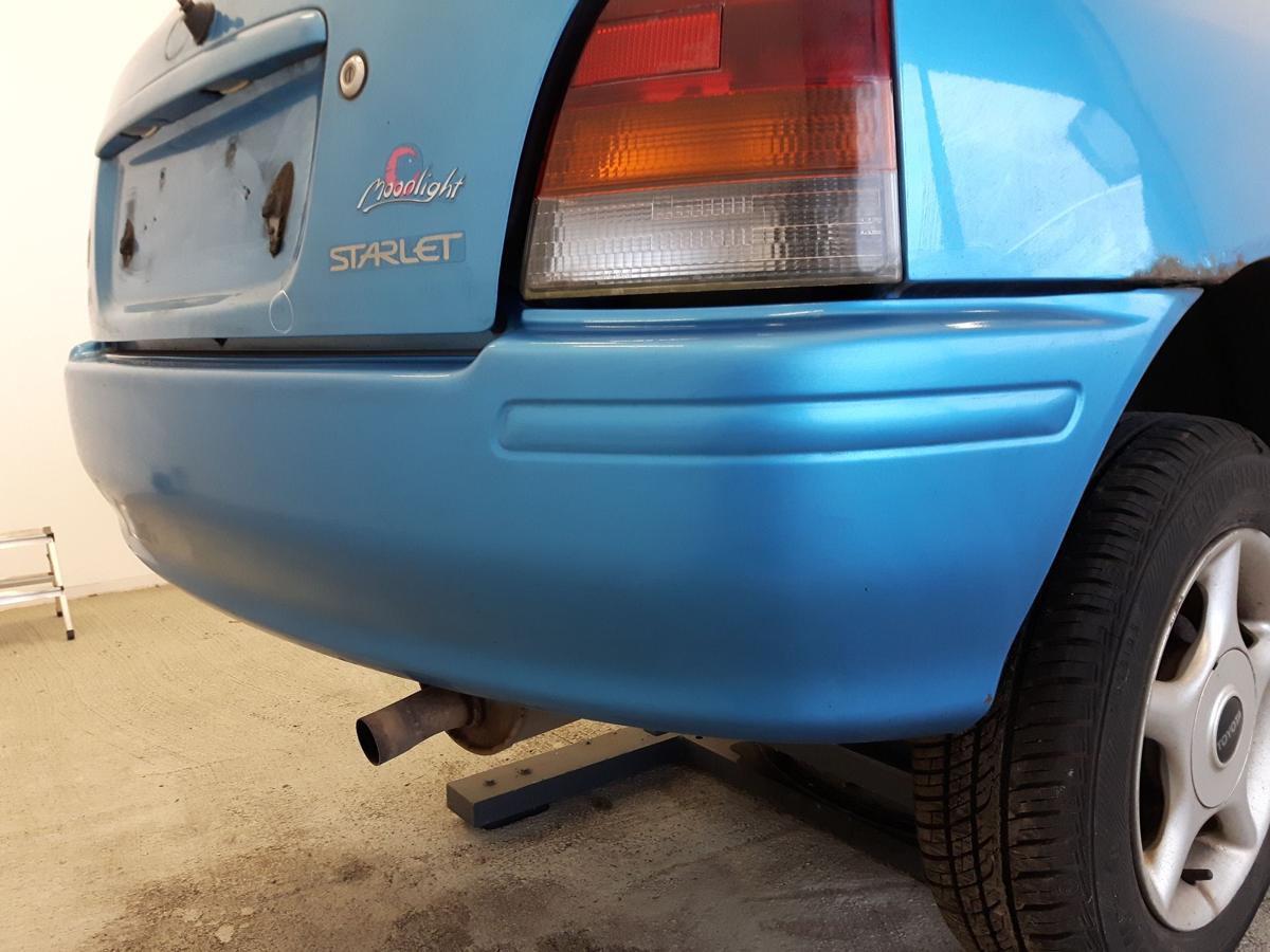 Toyota Starlet P9 original Stossfänger Stoßstange hinten Galaxy Blue Met. BJ97