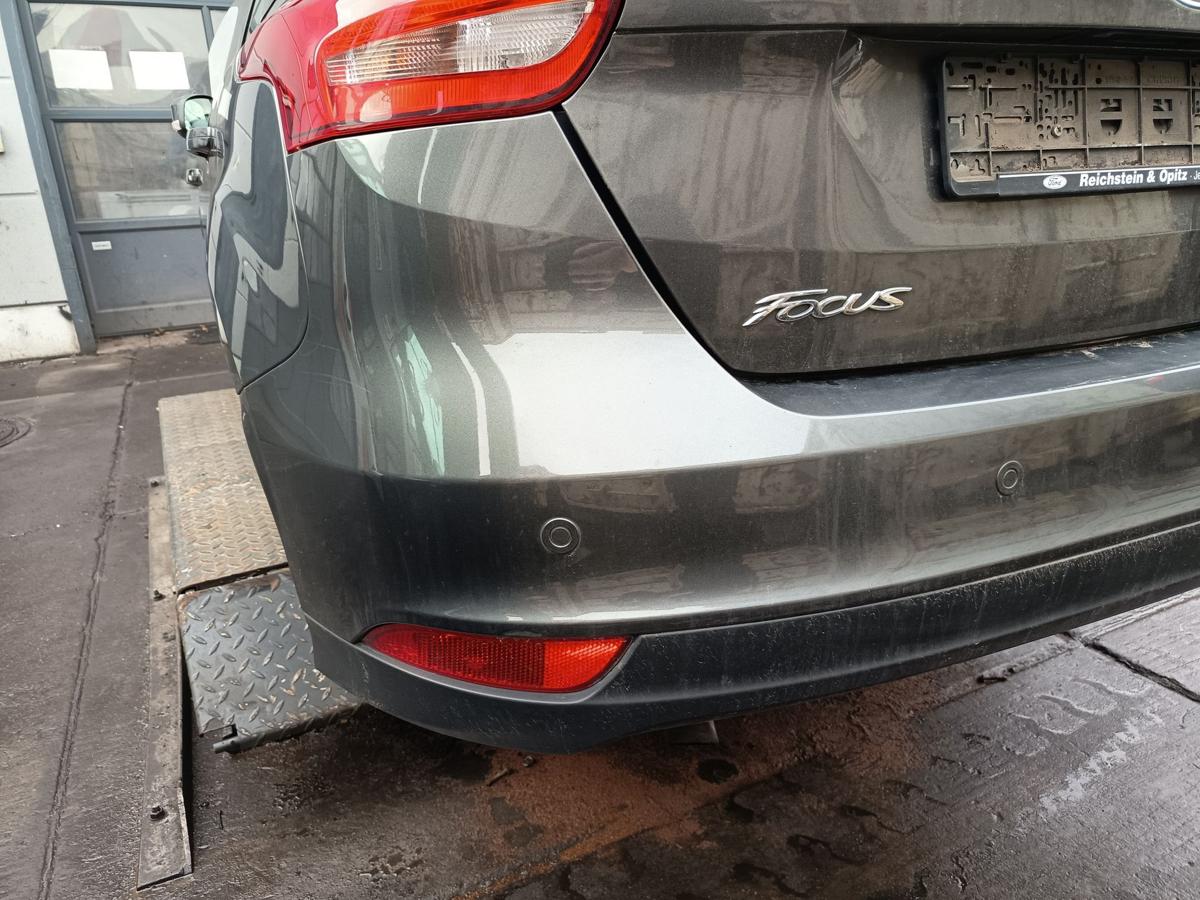 Ford Focus III Limo orig Sto&szlig;stange hinten Magnetic Grau Facelift PDC Bj 2015