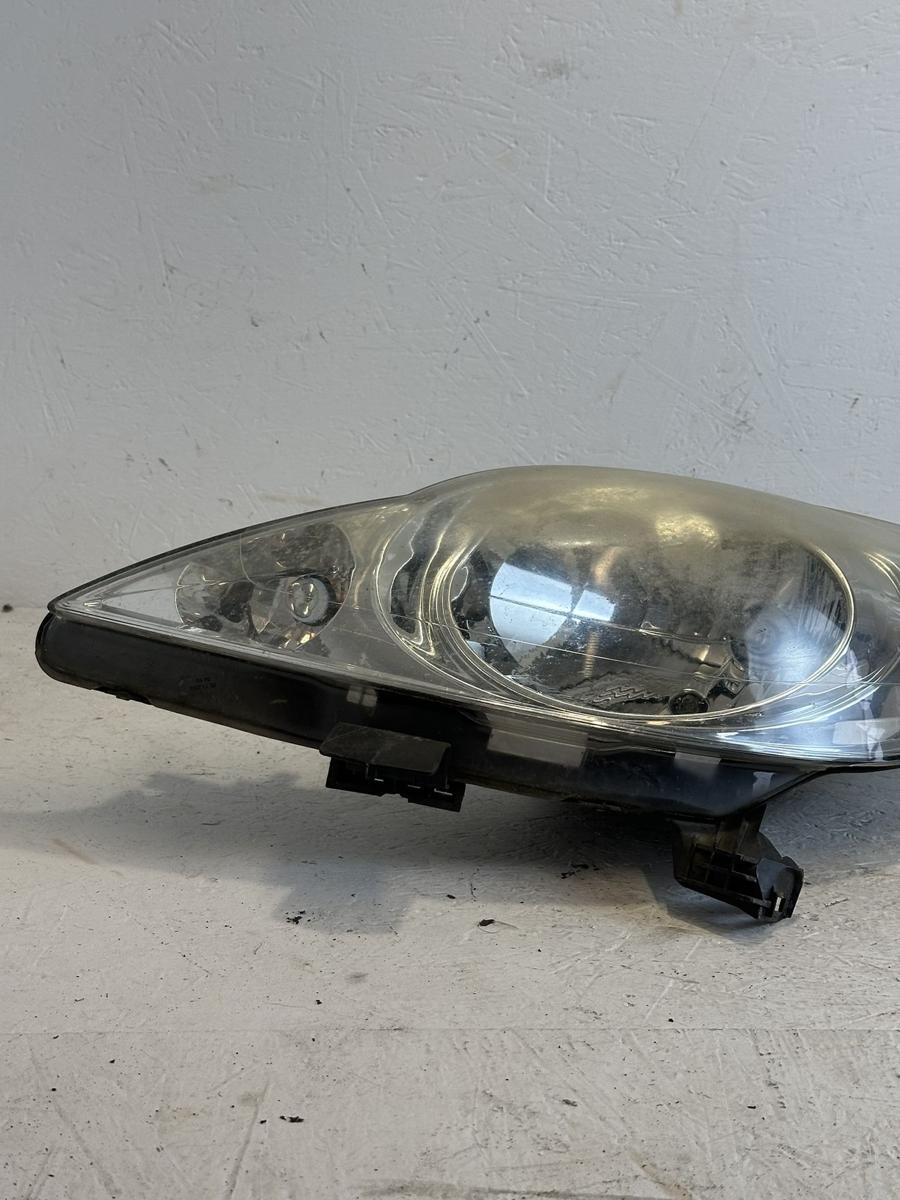 Peugeot 107 Typ P Scheinwerfer links Hauptscheinwerfer Lampe Trübung Valeo OE