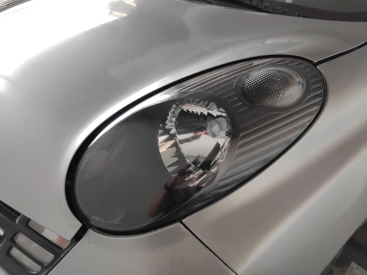 Nissan Micra K12 Scheinwerfer links Depo Halogen mit LWR schwarz BJ2005