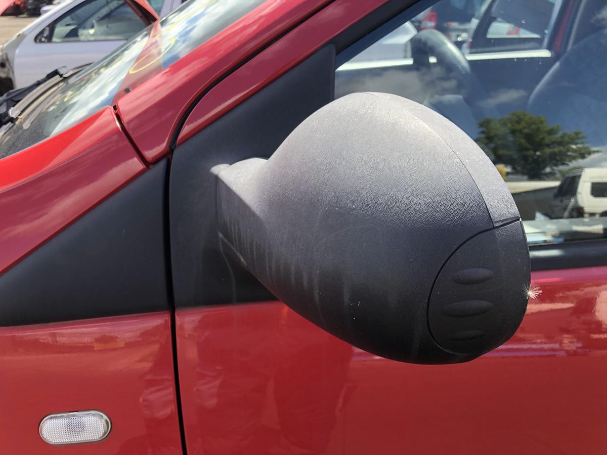 Renault Twingo II original Aussenspiegel links manuell schwarz Bj 2009