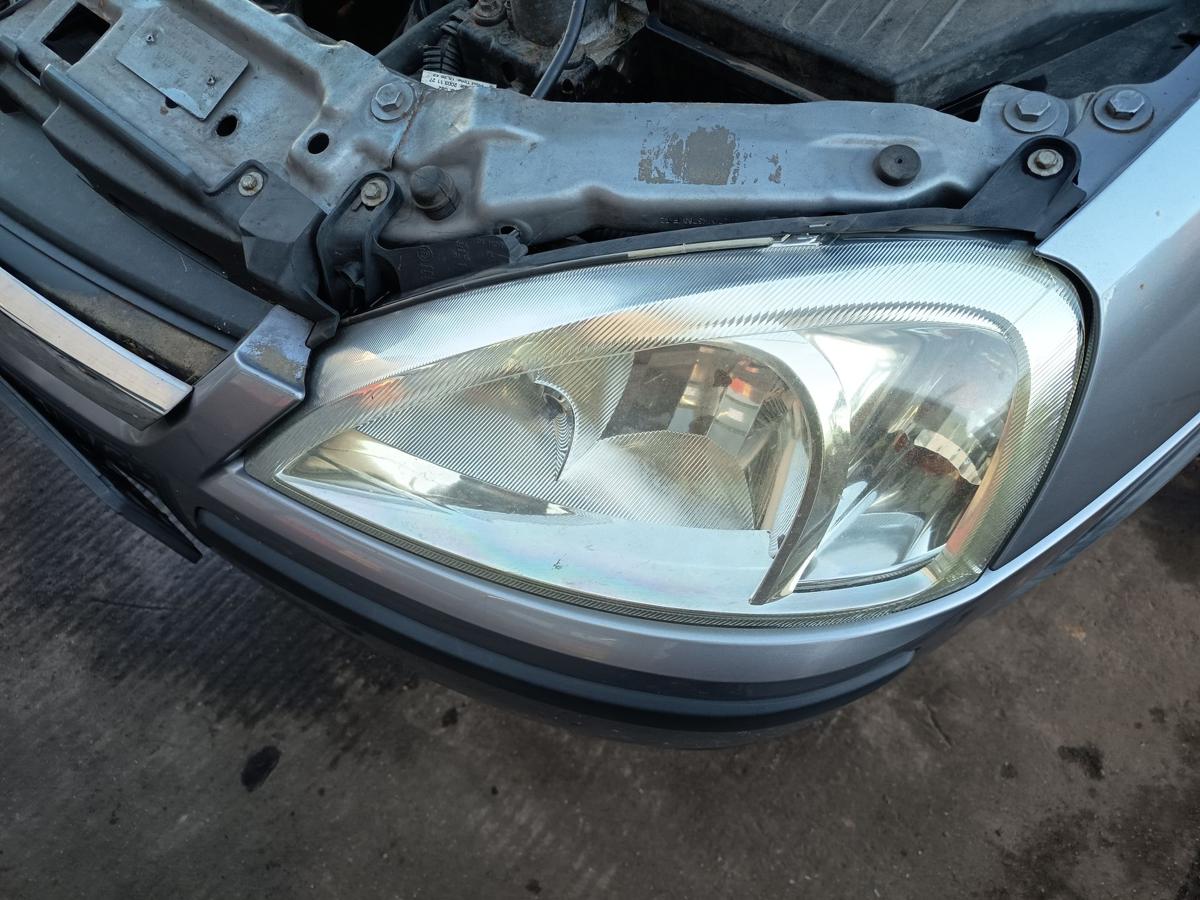 Opel Corsa C original Scheinwerfer links Halogen Haupt Licht Front Bj 2004