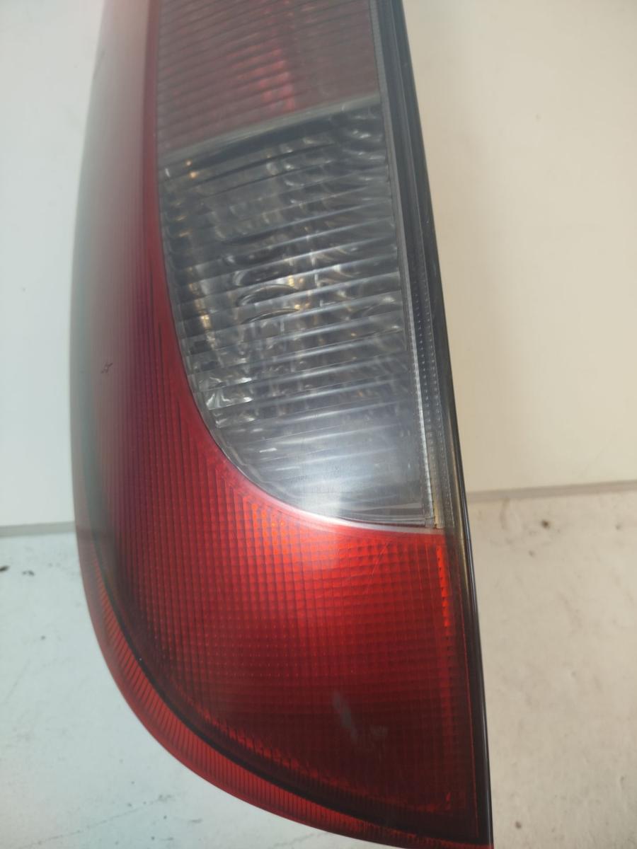 Opel Corsa C R&uuml;ckleuchte links R&uuml;cklicht Heckleuchte 3 t&uuml;rer get&ouml;nt OEM