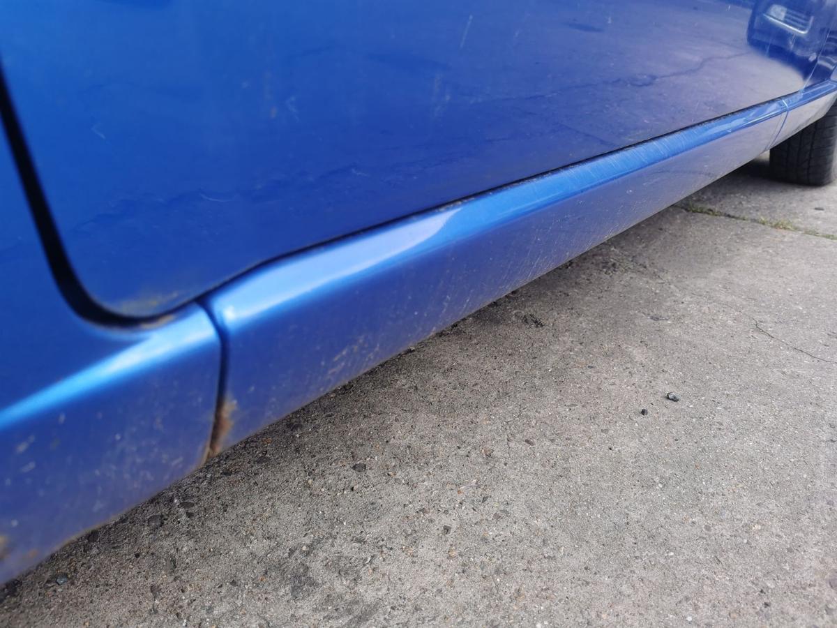 Daihatsu Cuore 251 Fahrertür Tür Autotür Rohbautür vorn links B51 Blue Perl TEXT