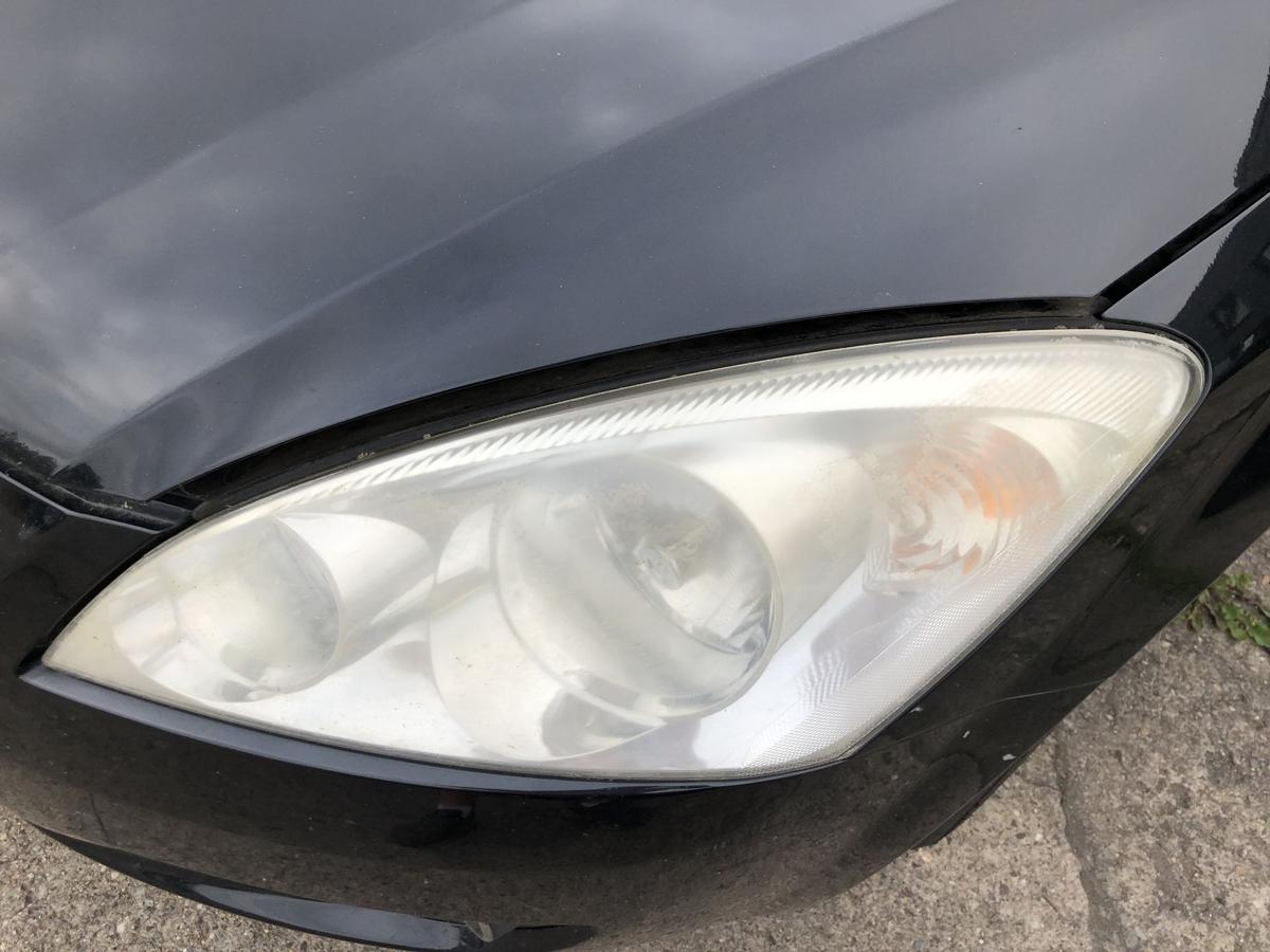 Kia Ceed SW Typ ED Scheinwerfer links Hauptscheinwerfer Halogen Tr&uuml;b Lampe