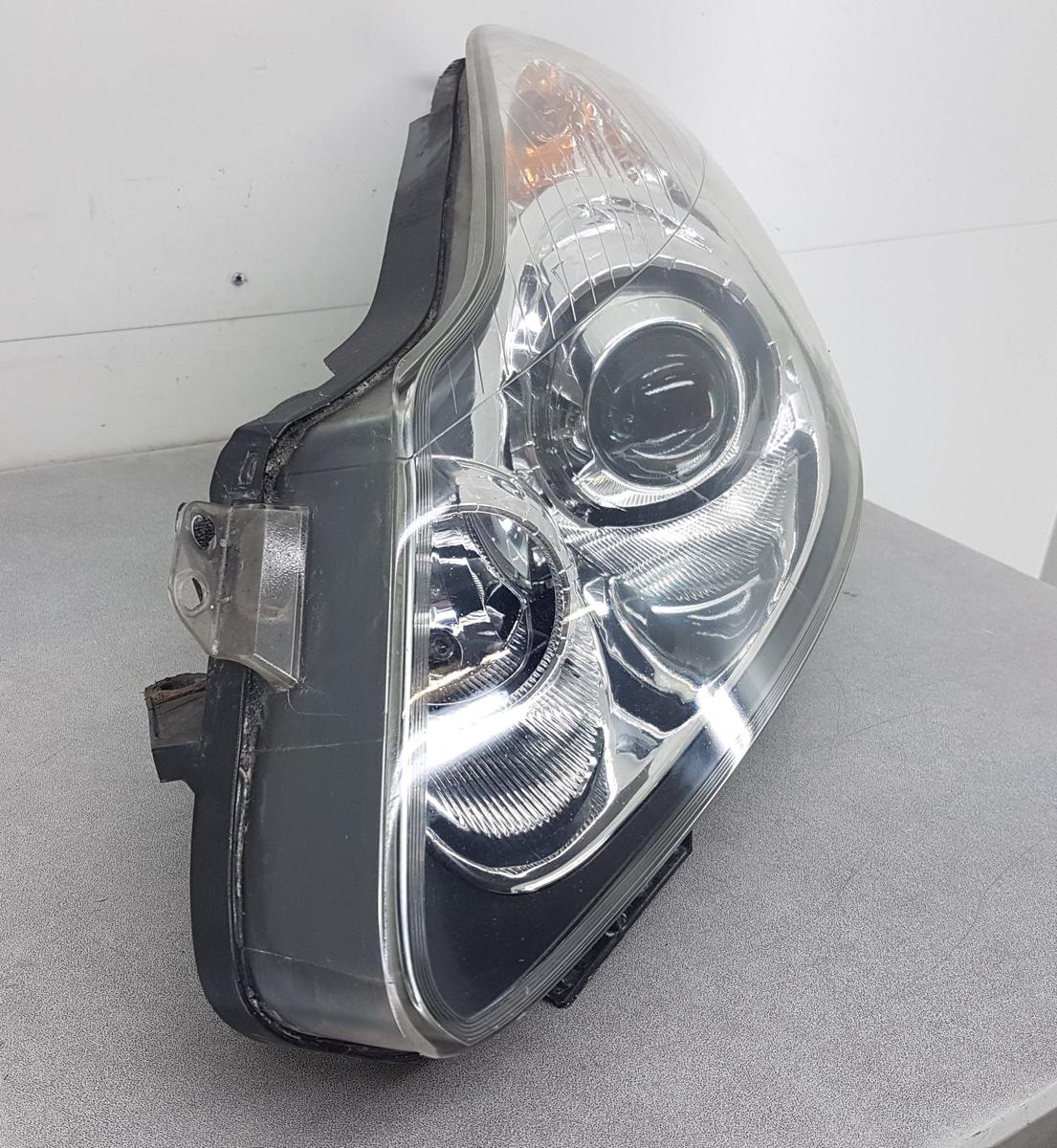 Opel Corsa D Hauptscheinwerfer Frontscheinwerfer links 13186385 Kurvenlicht Bj08