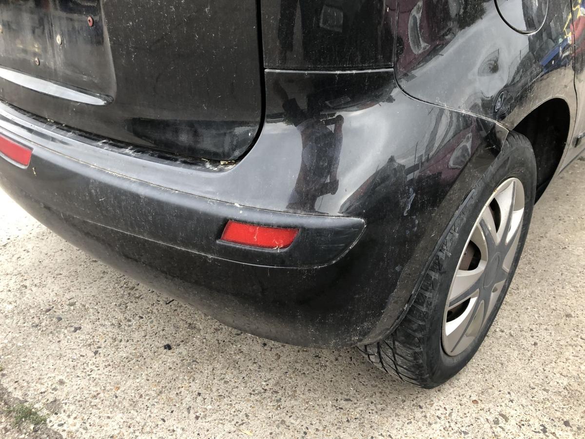 Nissan Note E11 Sto&szlig;f&auml;nger hinten Hecksch&uuml;rze Sto&szlig;stange Heck schwarz