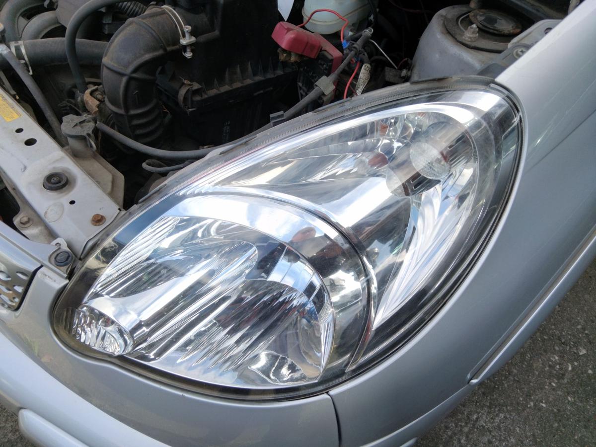 Toyota Yaris Verso original Scheinwerfer links Halogen mit LWR Facelift BJ2004