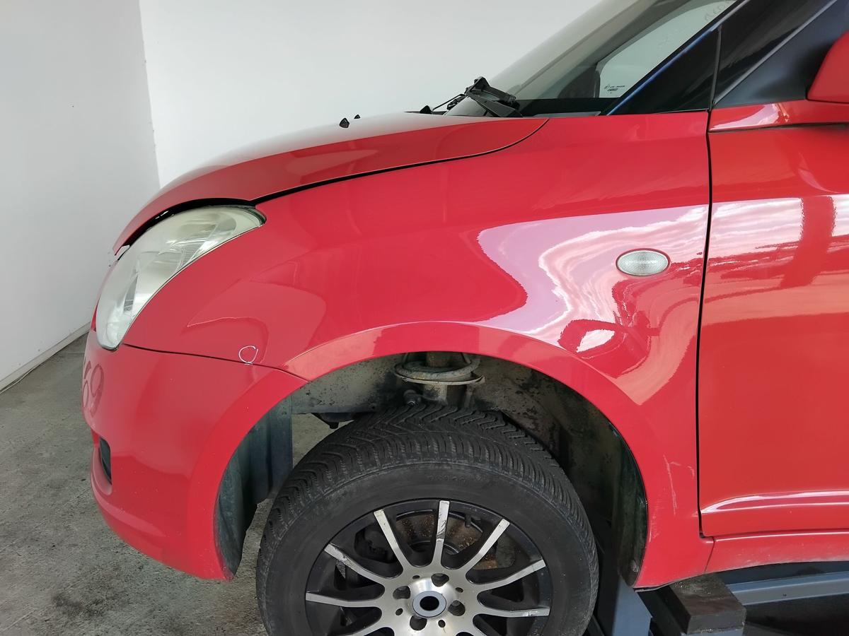 Suzuki Swift 4 MZ original Kotfl&uuml;gel vorn links ZCF Bright Red 5 BJ2008