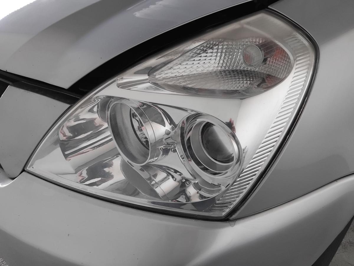 Kia Carnival III MB original Scheinwerfer links Halogen mit LWR BJ2007