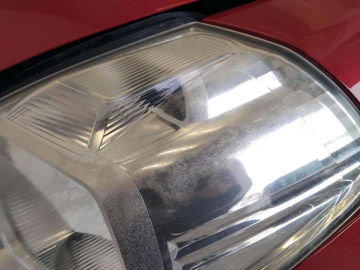 Nissan Tiida C11 original Scheinwerfer links Halogen mit LWR BJ2009 tr&uuml;b