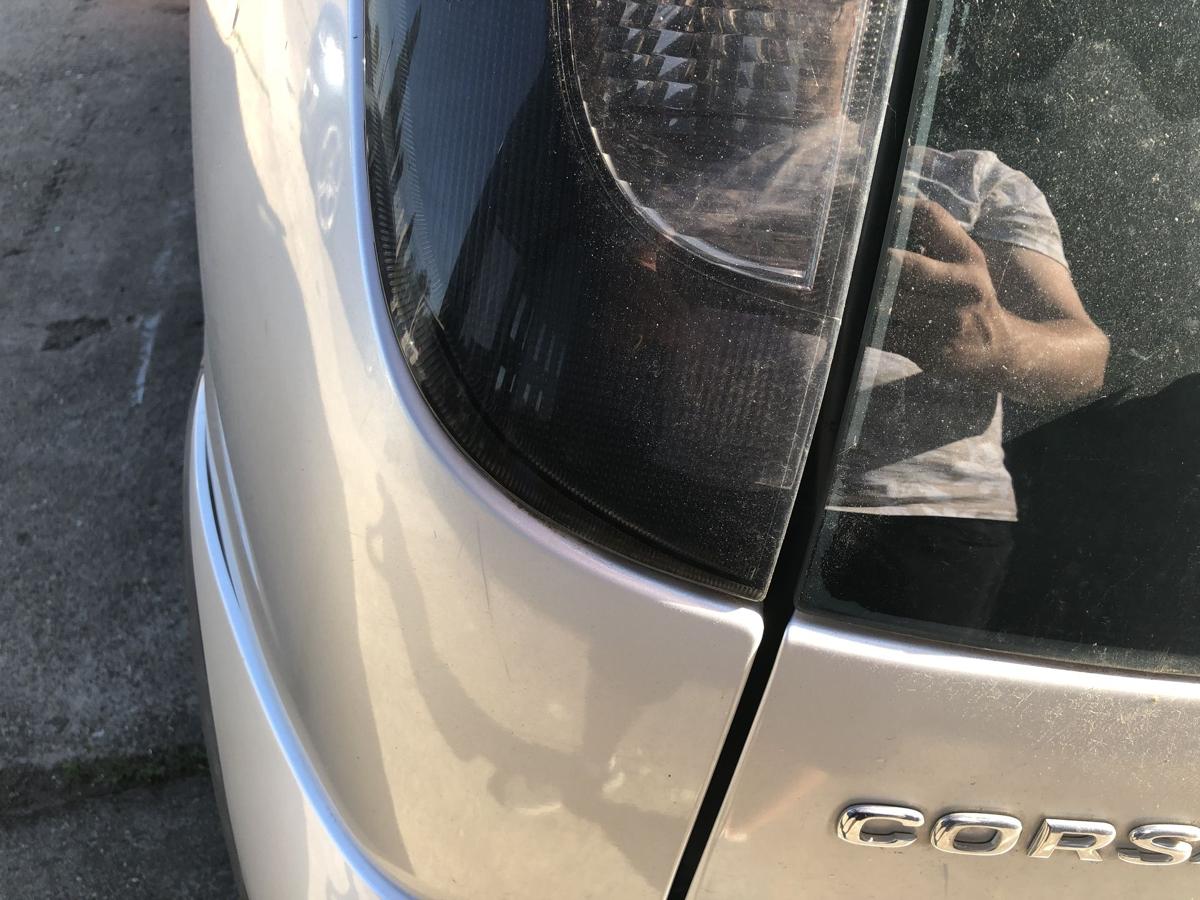 Opel Corsa C ab 2003 Rückleuchte links Rücklicht Heckleuchte dunkel getönt