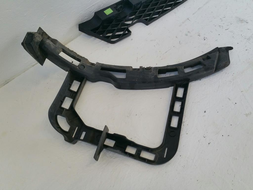 VW Passat 3C B7 ab10 original Plastik Halterset Stoßfänger hinten