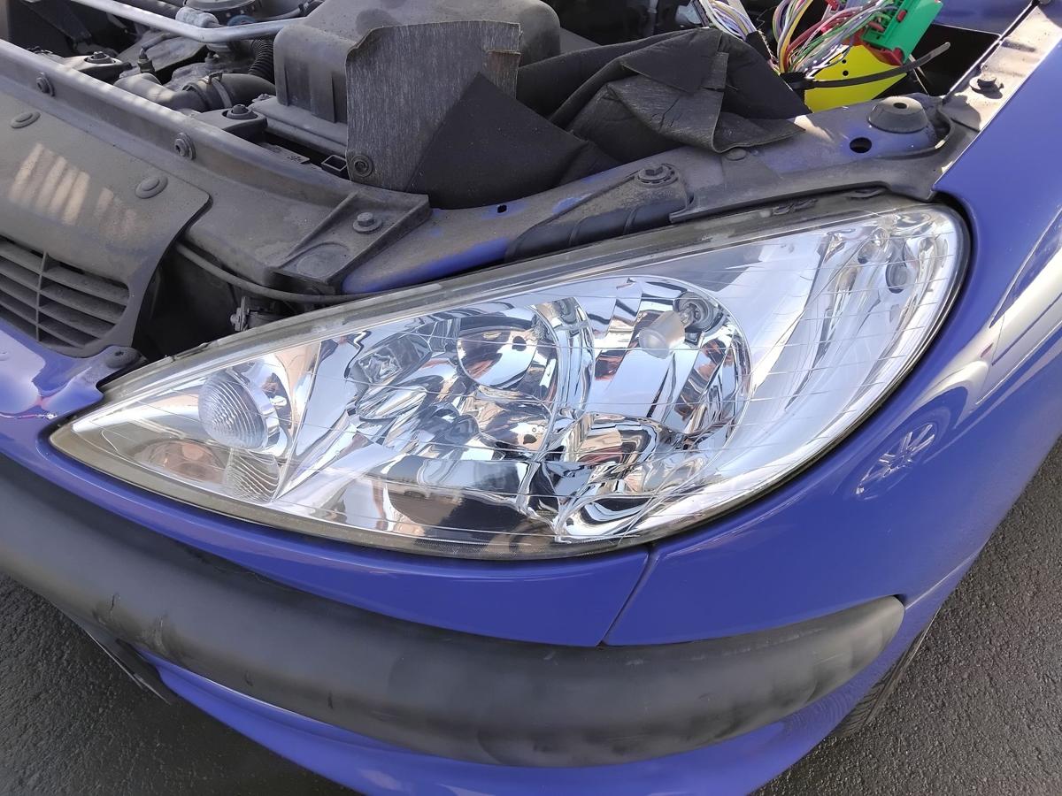 Peugeot 206 original Scheinwerfer vorn links Facelift Halogen mit LWR BJ2005