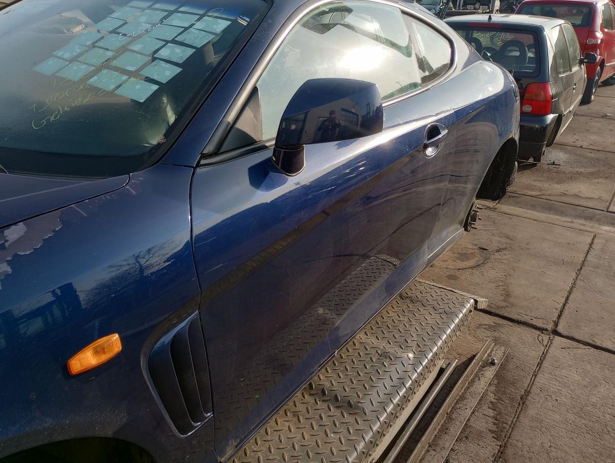 Hyundai Coupé orig Rohtür links Fahrer UC Carbon Blue Mica Bj 2002