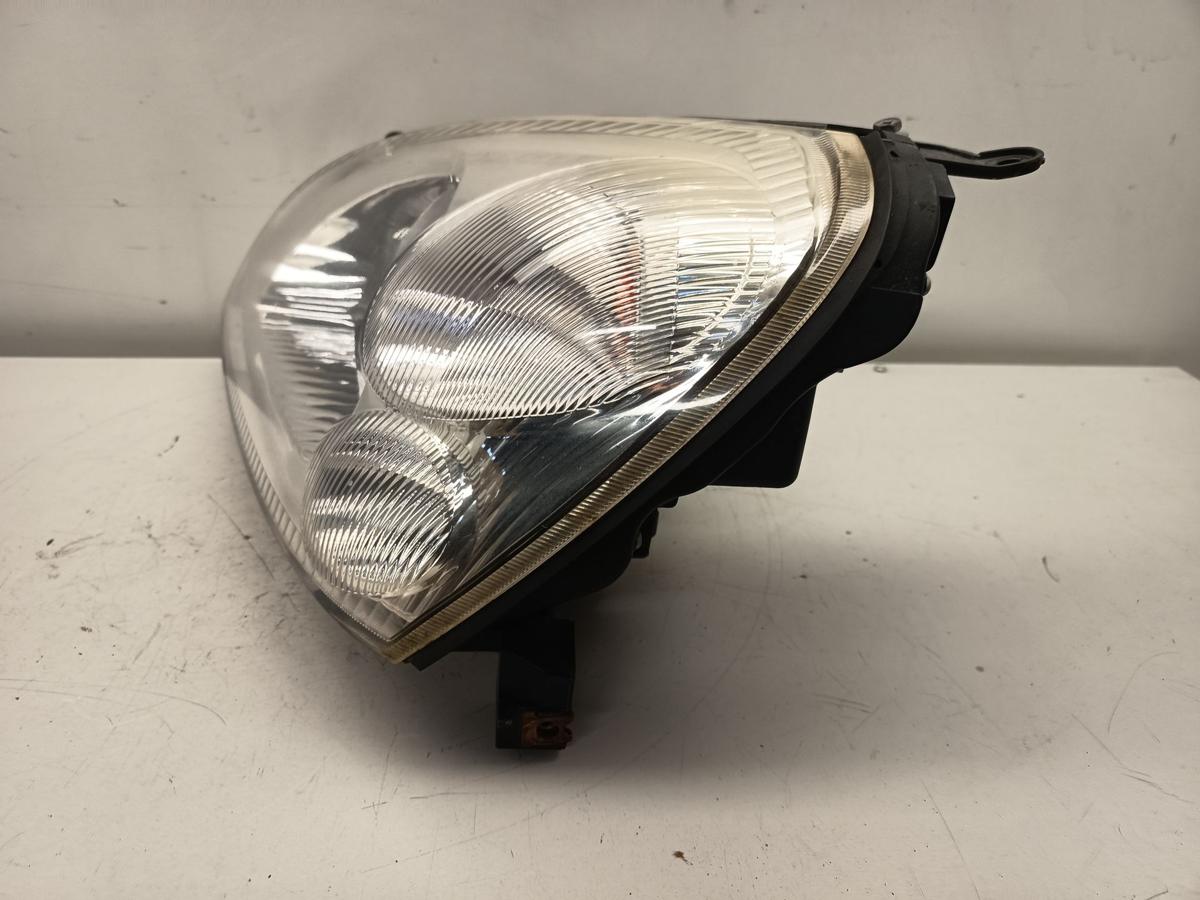 Suzuki Liana original Scheinwerfer links Halogen Haupt Licht Bj 2007