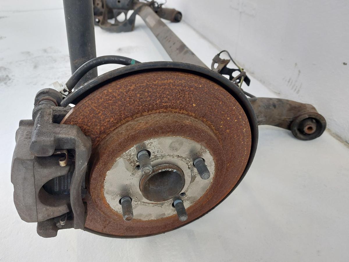 Toyota IQ Typ AJ Hinterachse Achse hinten Achsk&ouml;rper mit Schiebenbremse