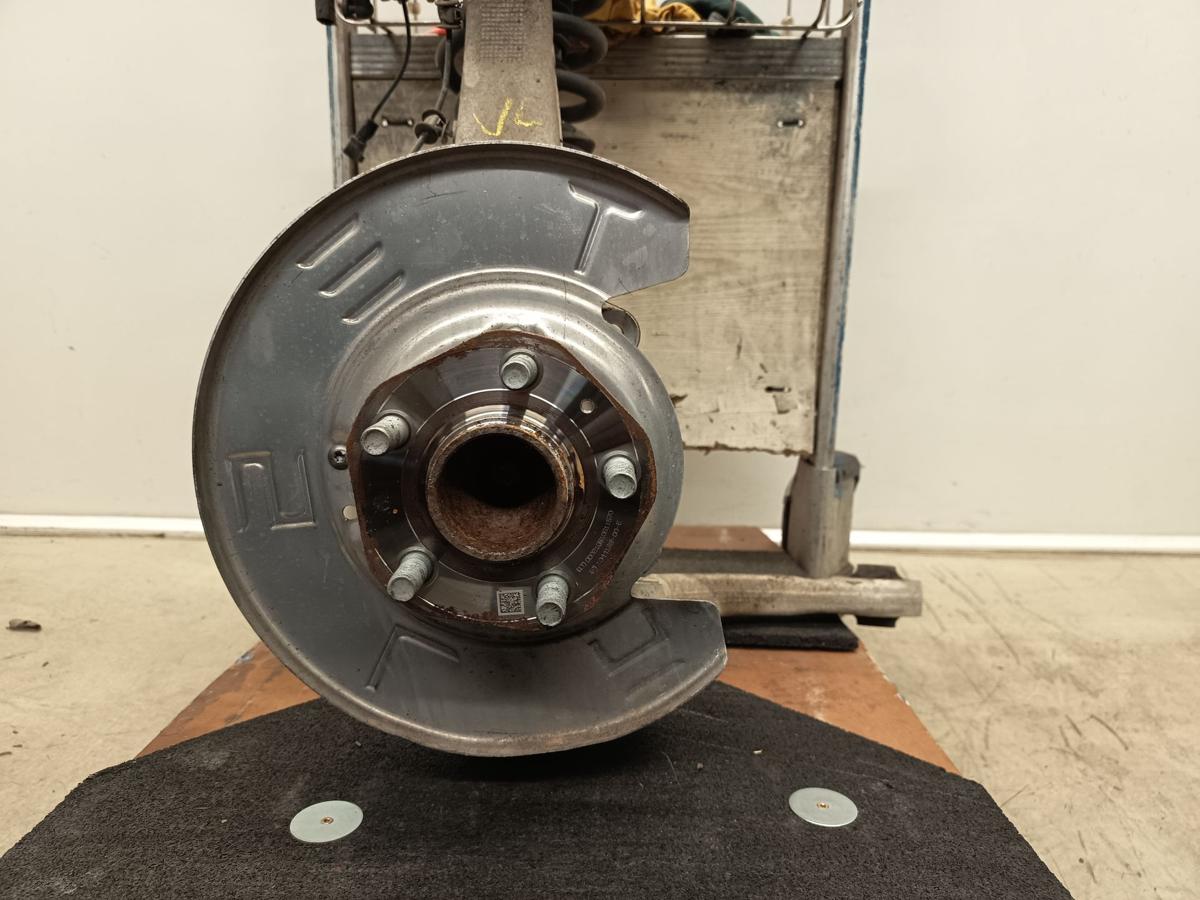 Tesla Model 3 original Federbein komplett 104432100J vorne links Baujahr 2021