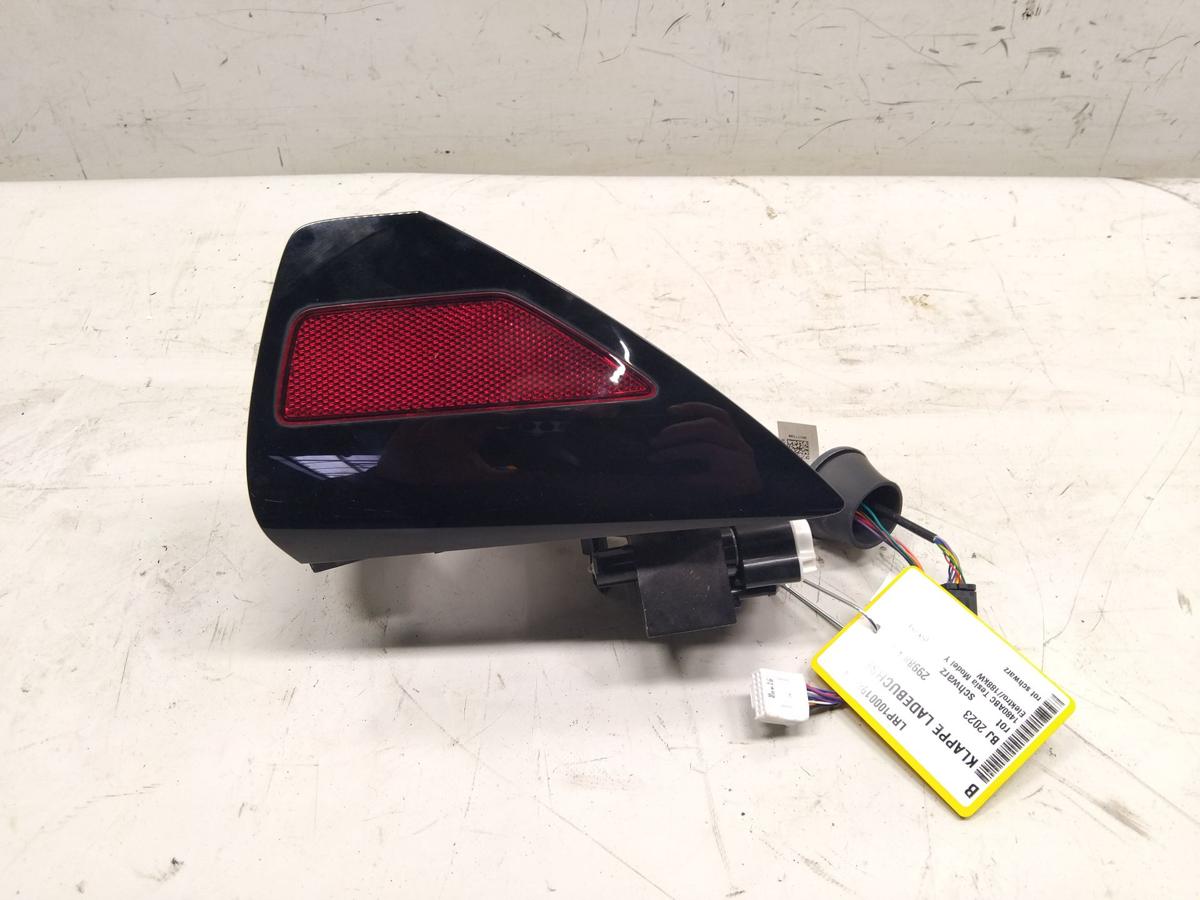 Tesla Model Y orig Ladeklappe Blende Reflektor links Klappe Ladebuchse BJ2023