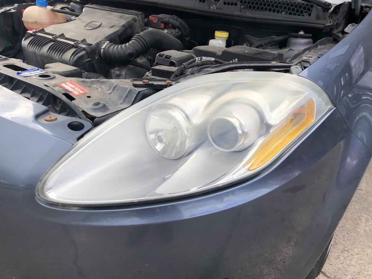 Fiat Bravo 198 Scheinwerfer links Hauptscheinwerfer Halogen Tr&uuml;b Blind OEM