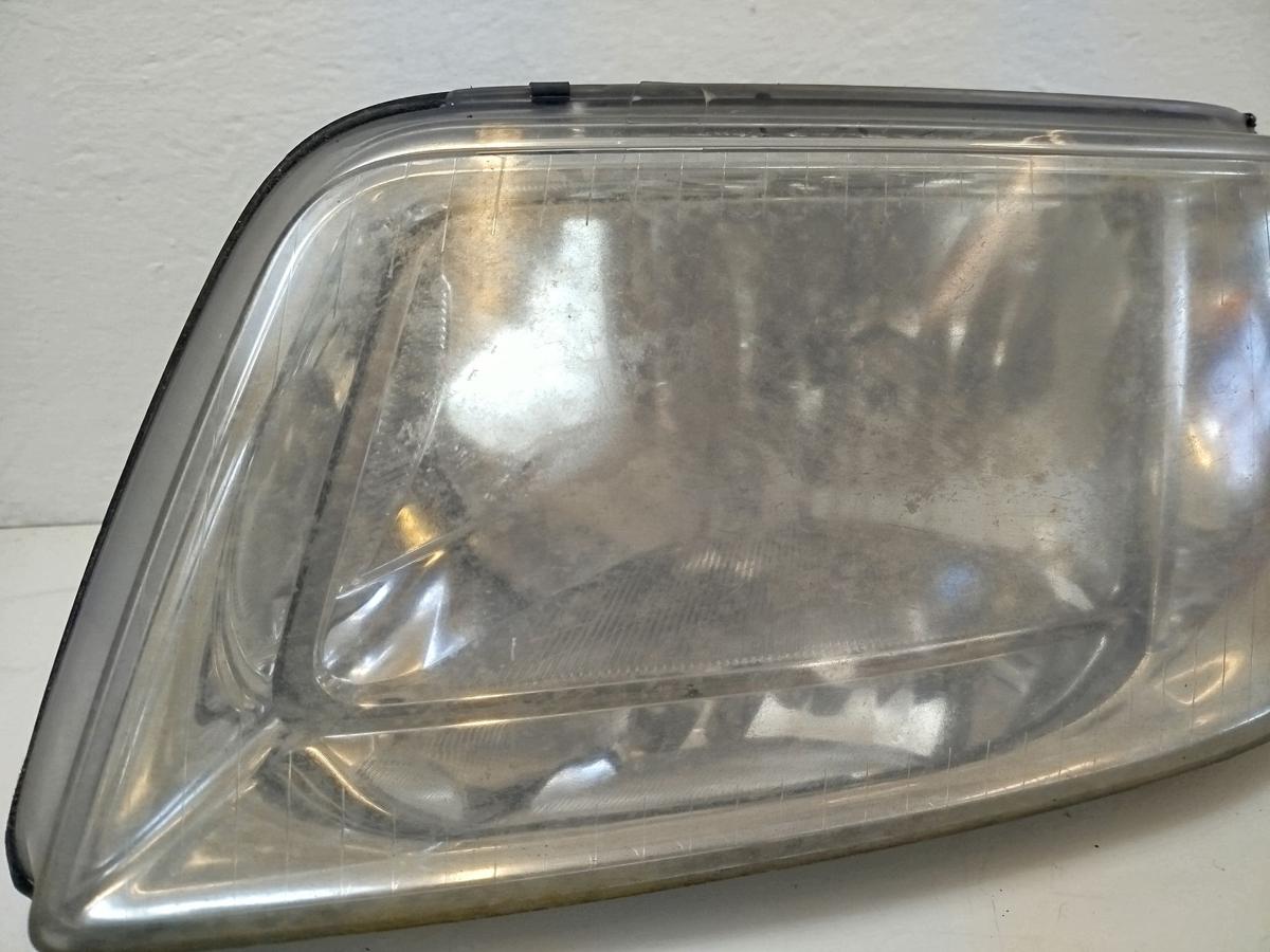 VW T5 7H Scheinwerfer vorn links Frontscheinwerfer Haligen H4 Tr&uuml;b OEM