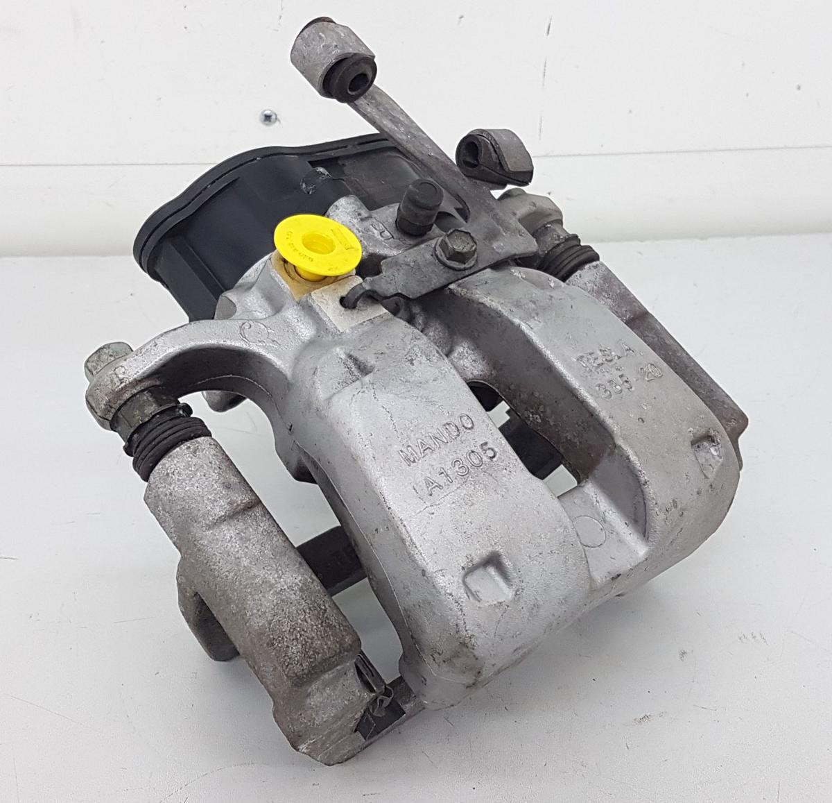 Tesla Model Y Bremssattel hinten links Bj2022 1044628-00-A inkl Tr&auml;ger