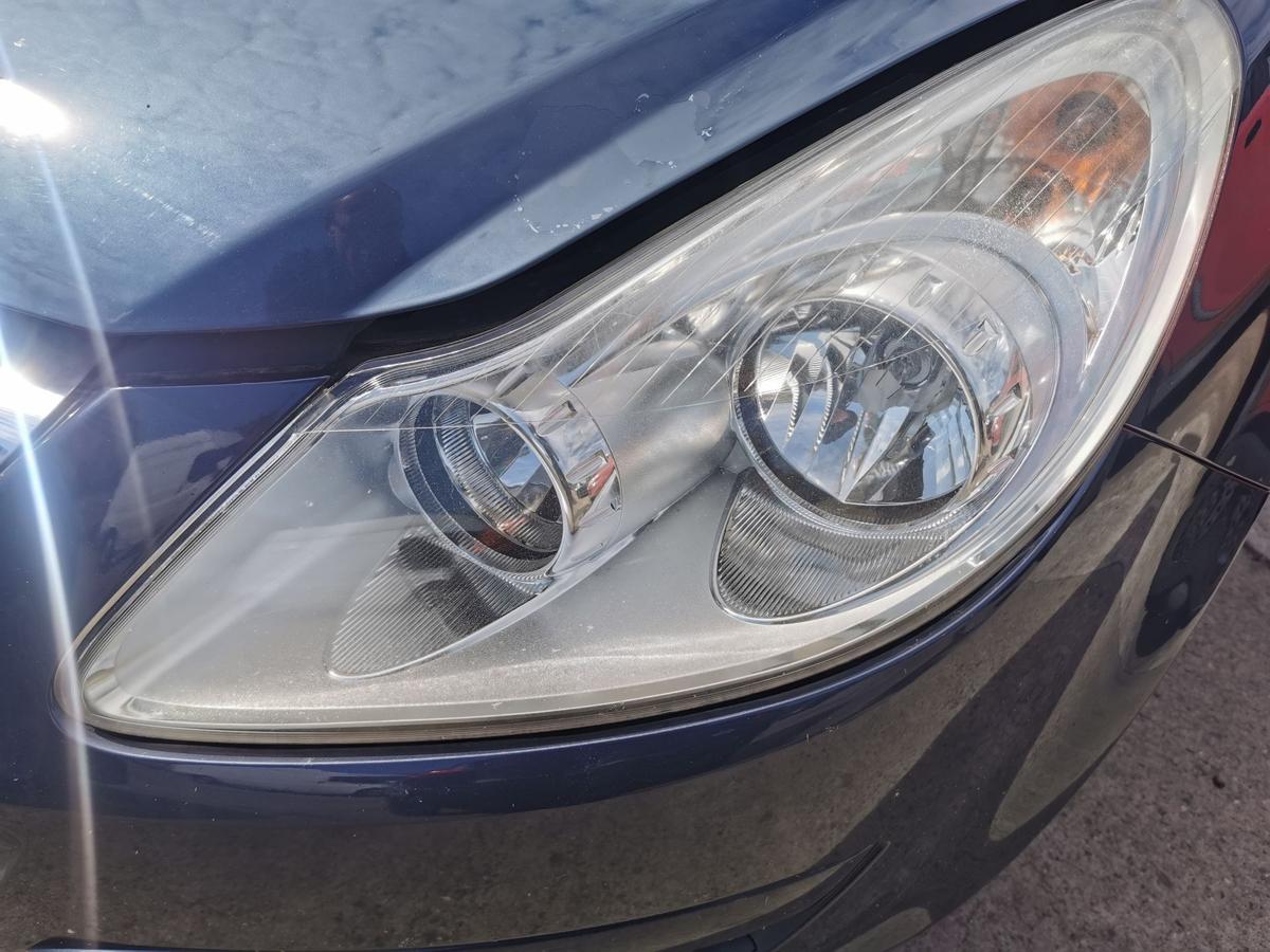 Opel Corsa D Scheinwerfer Frontscheinwerfer Hauptscheinwerfer vorn links OE