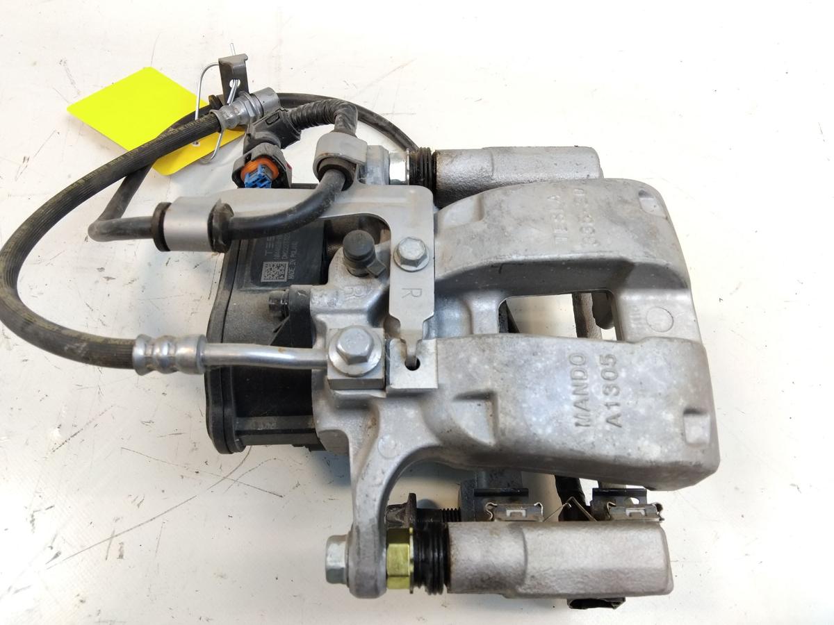 Tesla Model Y original Bremssattel Hinterachse rechts Mando 1044628-00-A Bj.2023