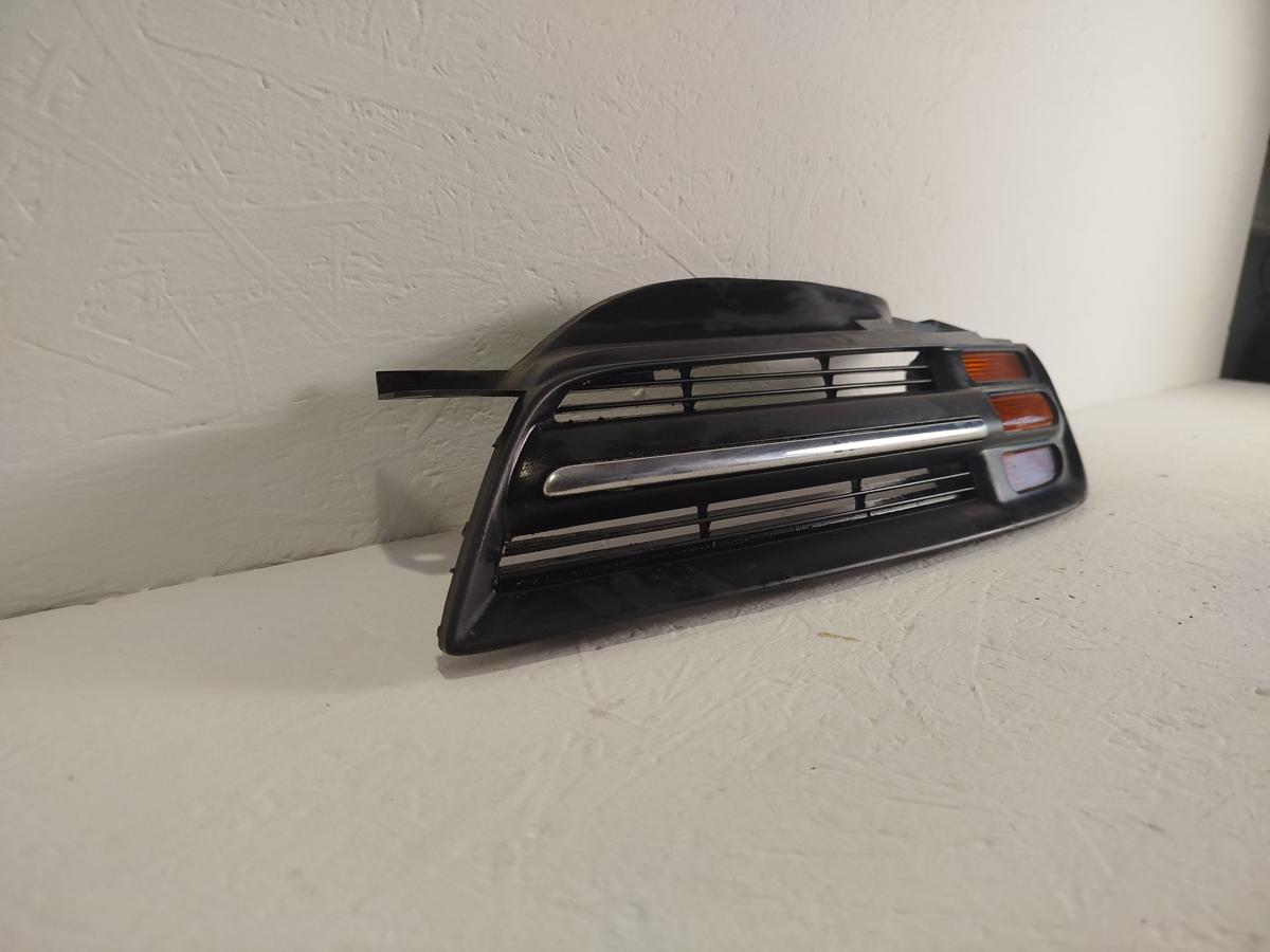 Nissan Micra K12 Kühlergrill Grill Frontgrill vorn Links Blinkleuchte gelb