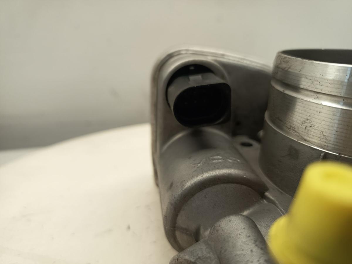 VW Golf V original Drosselklappe 1.6l 75kW Benzin 06A133062AT Baujahr 2007