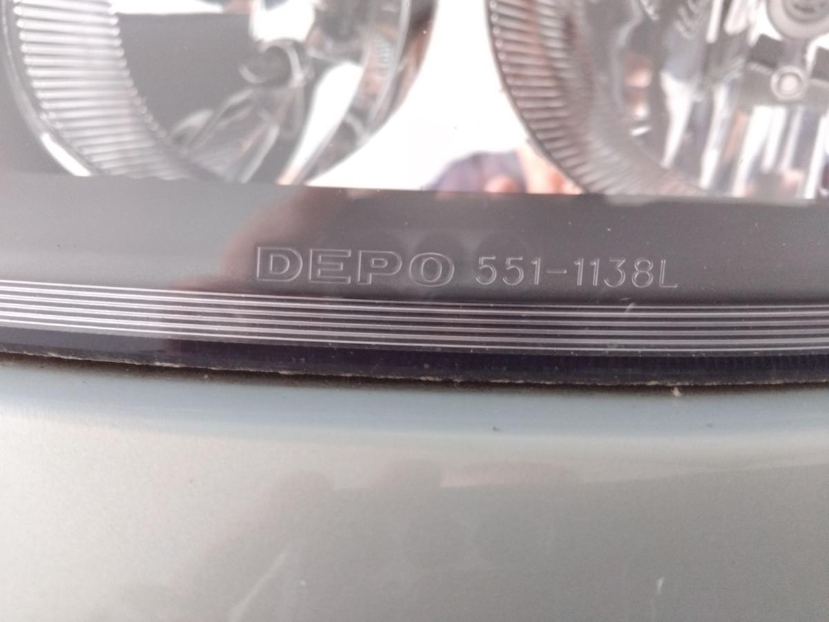 Renault Clio 2 Scheinwerfer links Depo grauer Hintergrund Facelift Halogen BJ04
